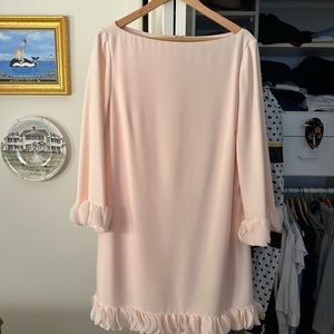 Light peach pink with flutter sleeves and hem